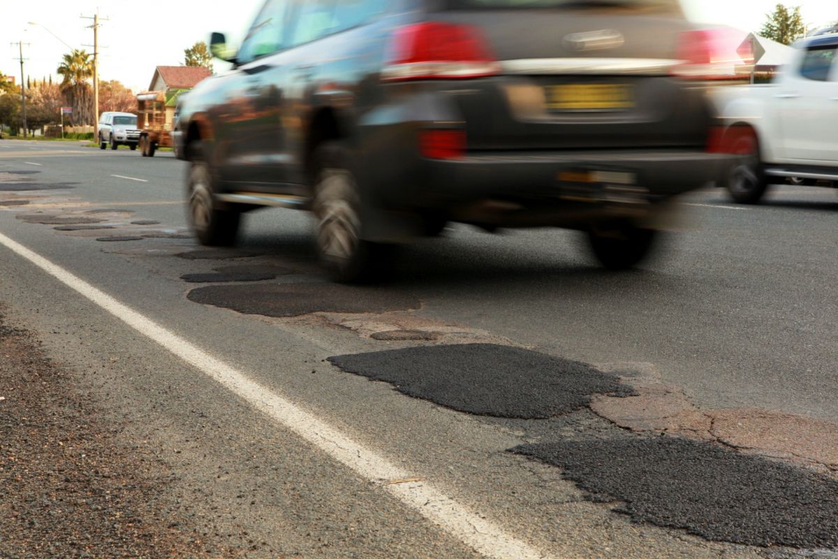 potholes on road and 4WD driving by