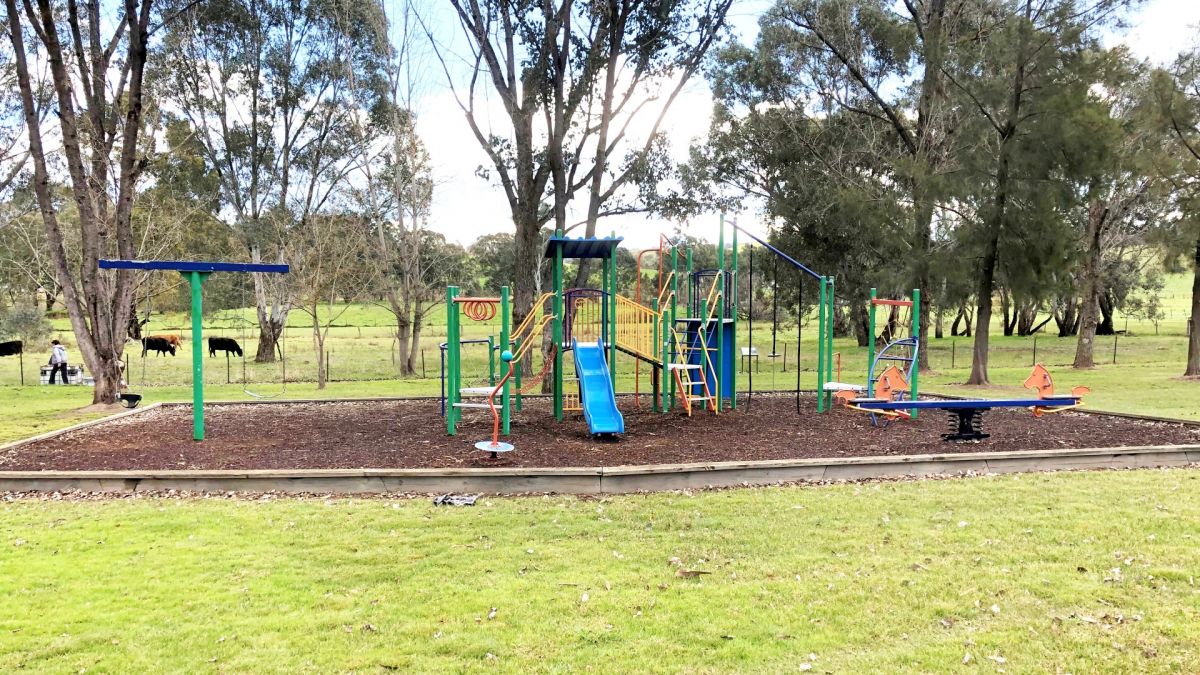 Park in rural area with playground equipment 