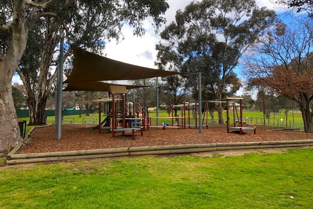 Playground covered by cloth.