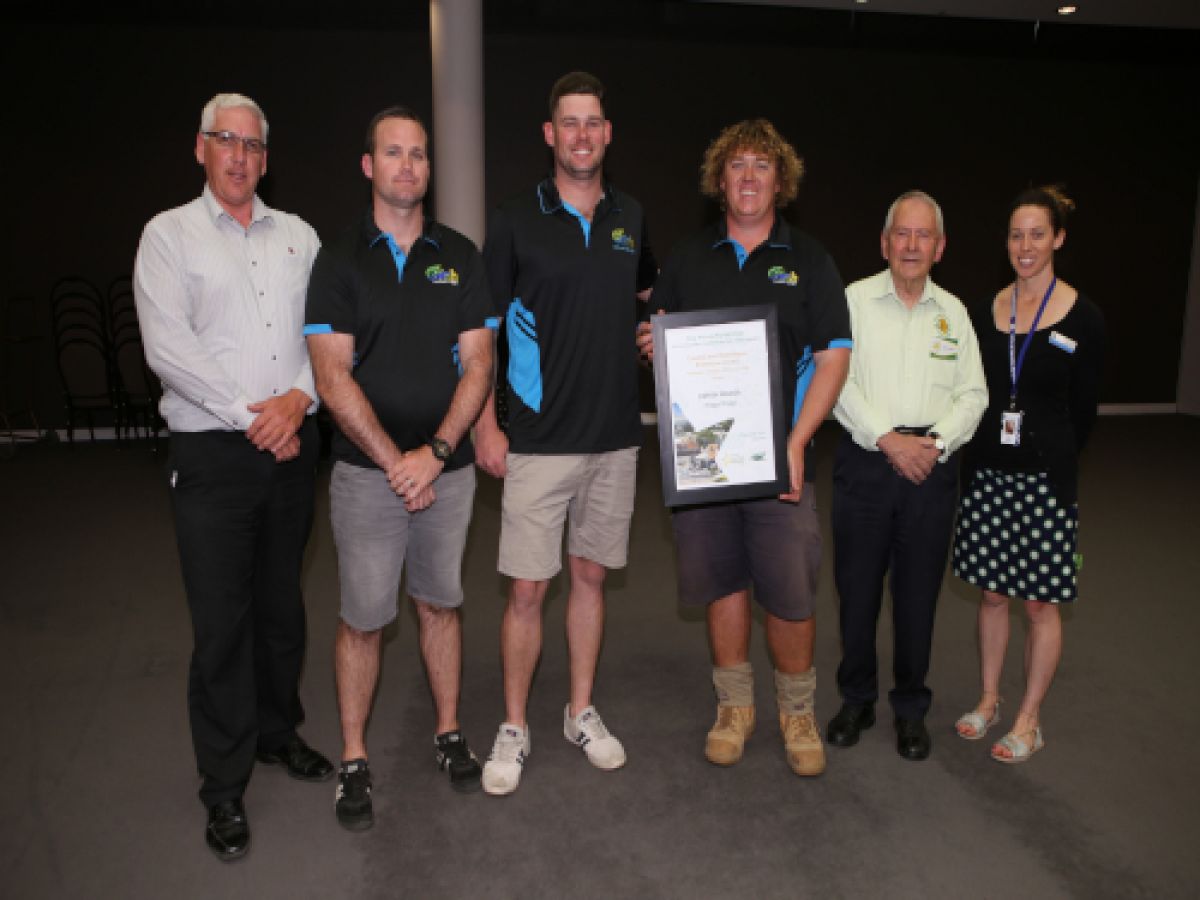 Wagga Wagga City Council staff congratulate OzFish Wagga Chapter volunteers on their award win.