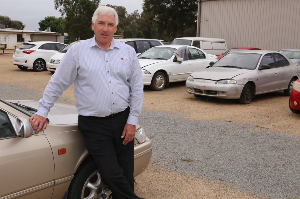 head shot of man standing in Council impound yard