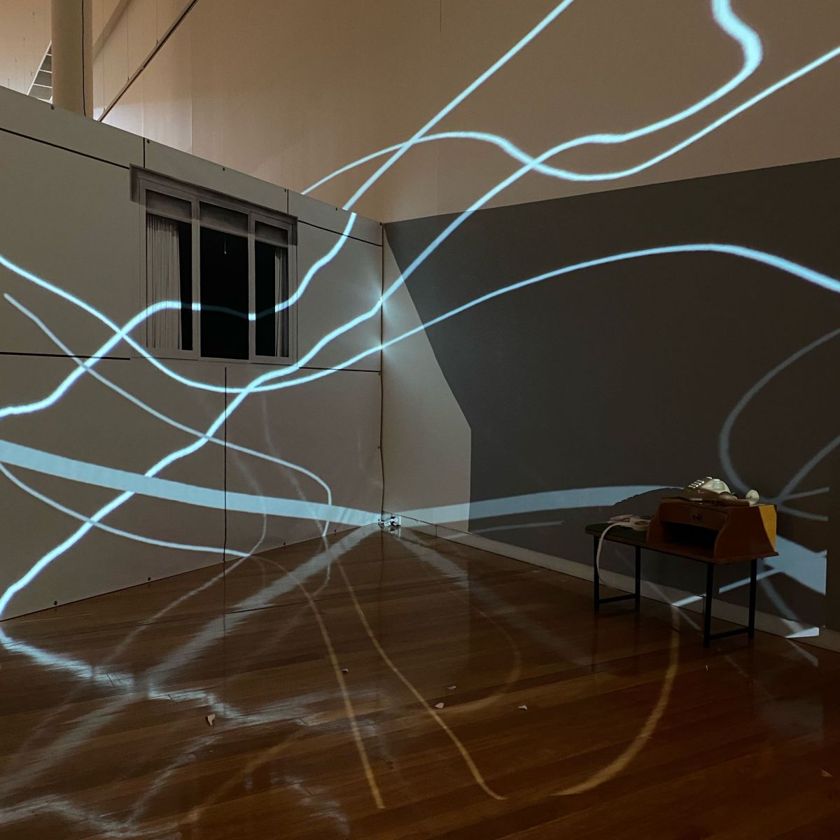 Light beams projected across a room