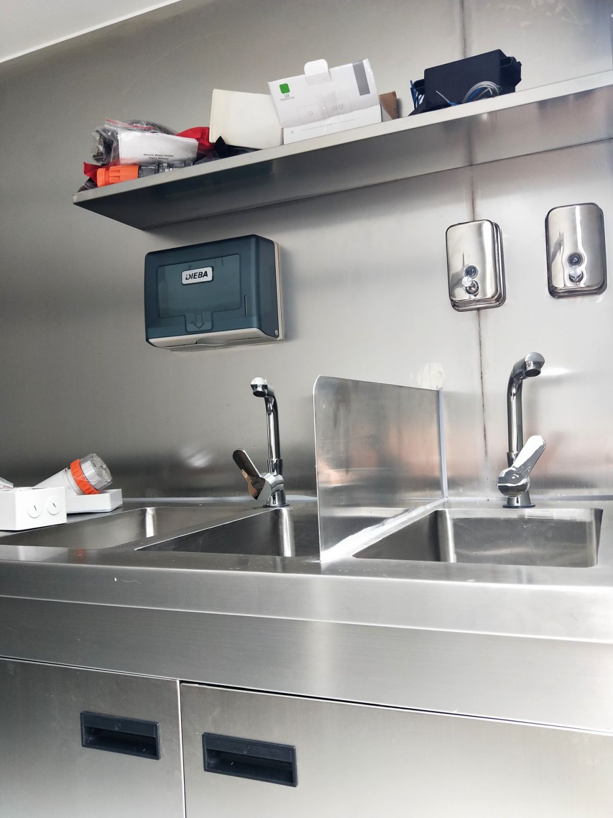 kitchen sink and bench inside food van