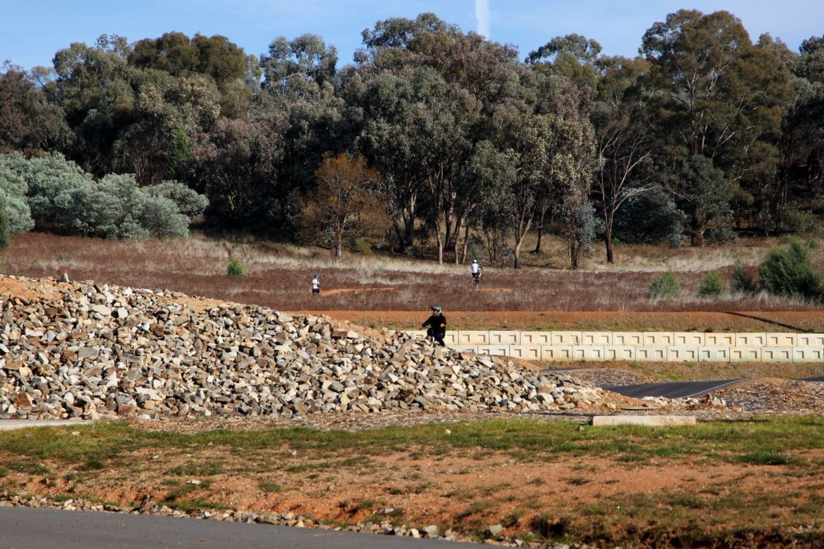 Mountain bike riders on track