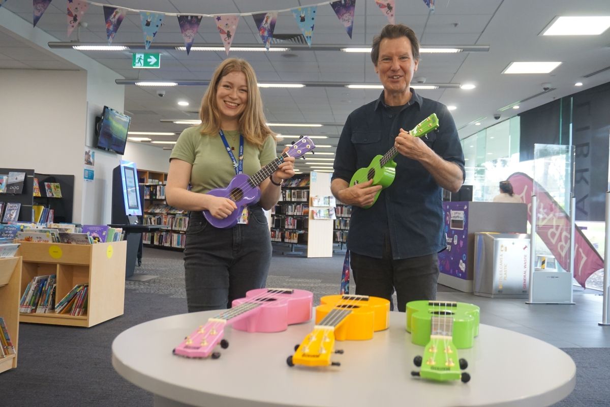 Senior Library Programs Officer Catherine Greenslade and Library Programs Officer Peter Casey in the Children's area of  Wagga Wagga City Library.