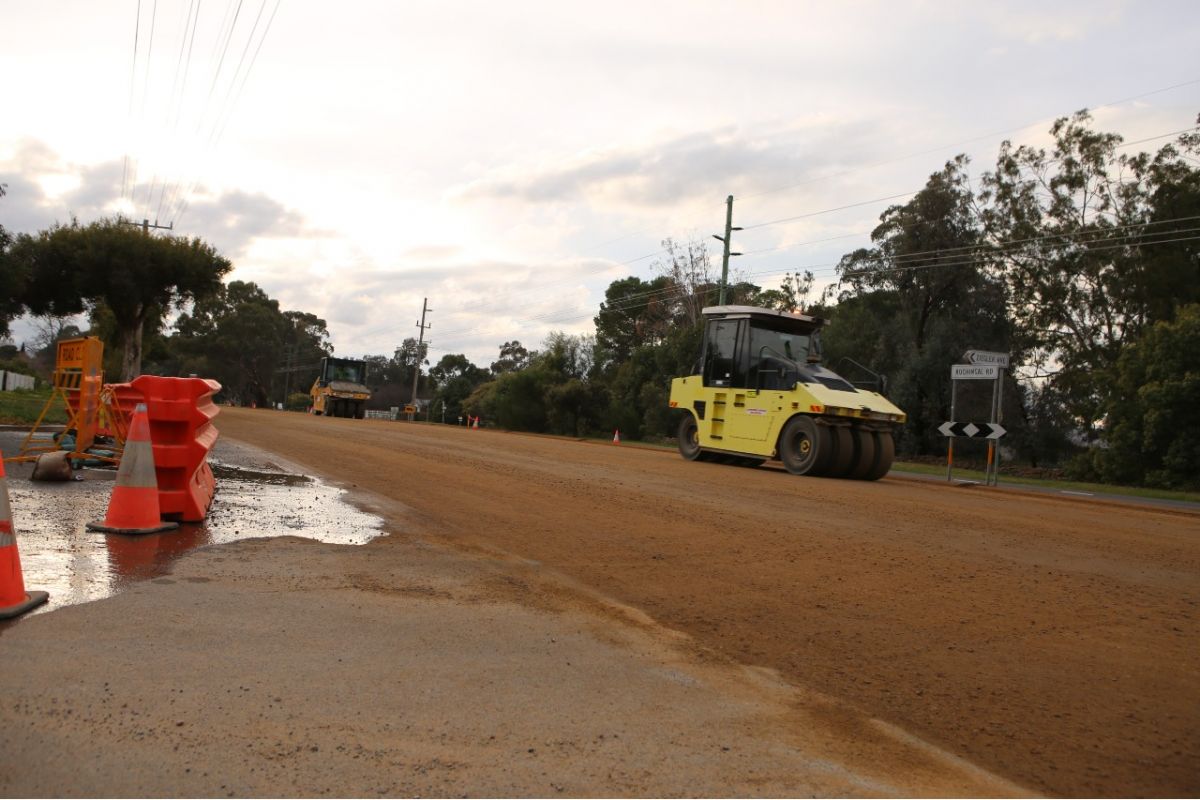 Rollers along new layer of road construction