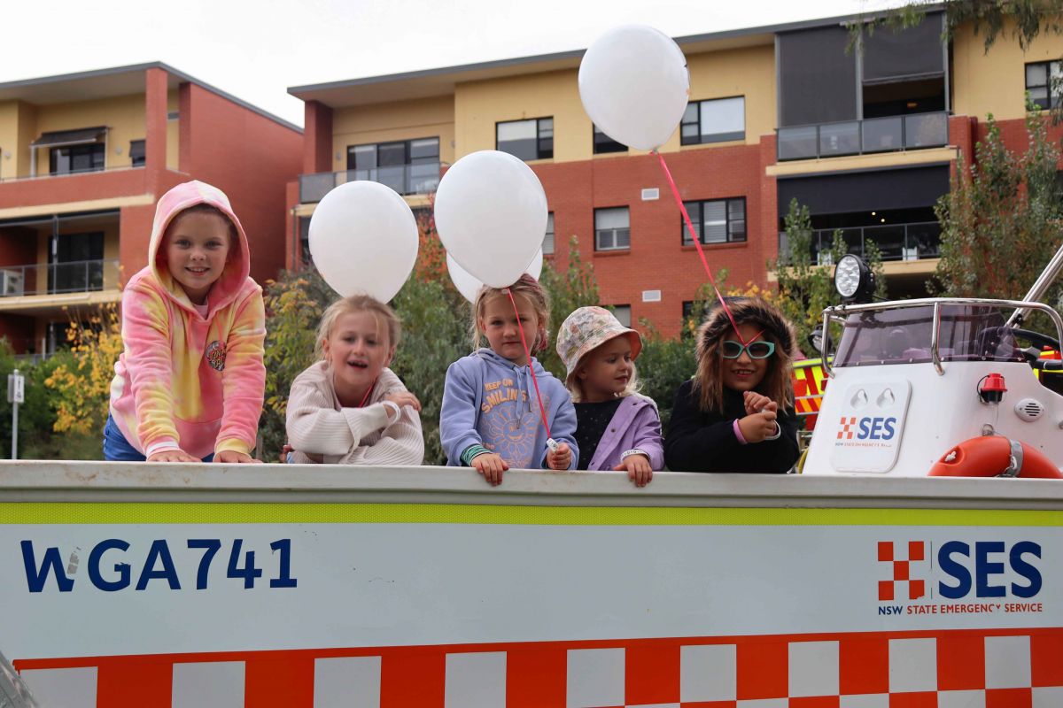 Five young girls standing on deck of SES boat