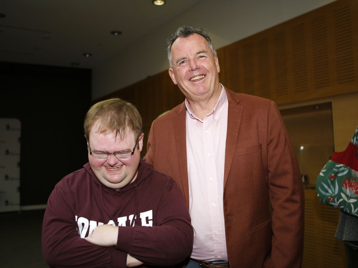 Mayor Dallas Tout standing beside young man - Hayden Watts