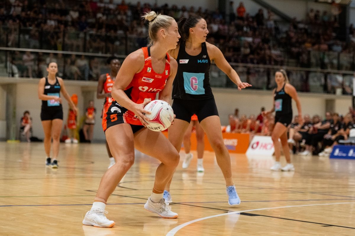 Women playing netball.