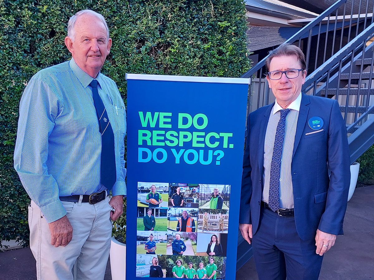Mayor Greg Conkey and Member for Wagga Wagga Dr Joe McGirr standing next to the We Do Respect banner