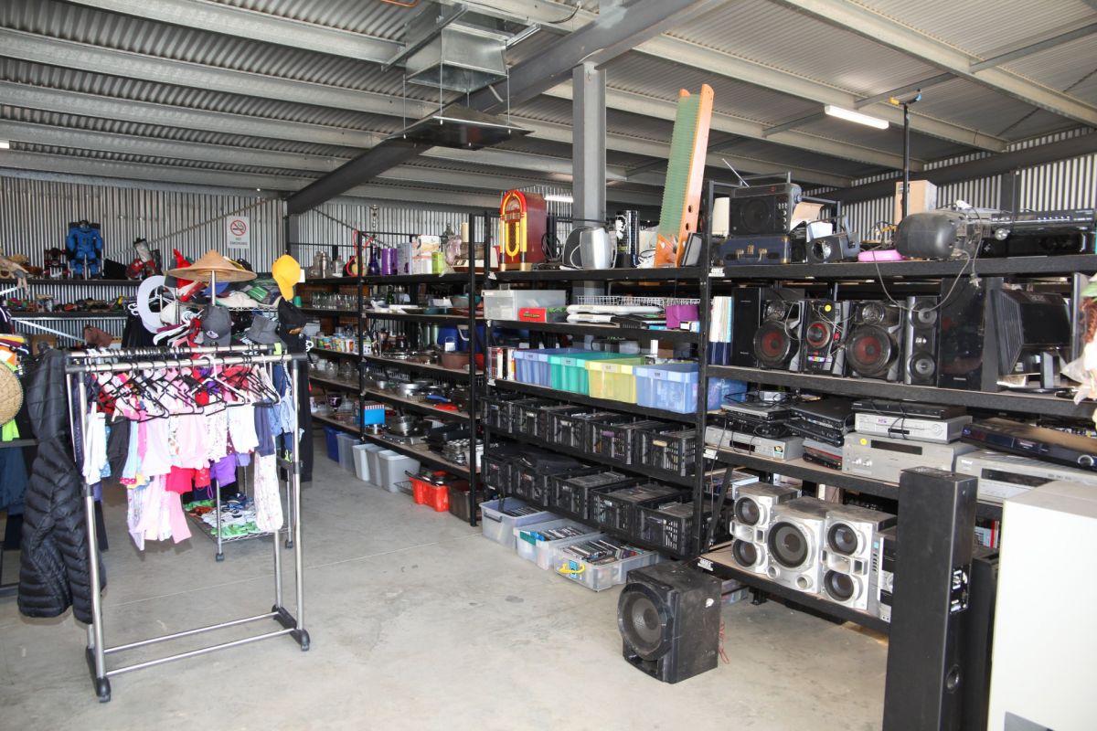 Shelves full of household and gardening items