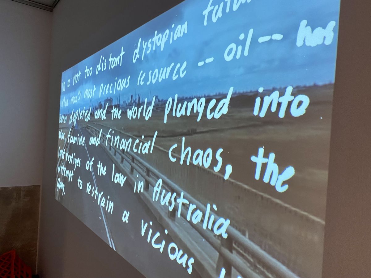 A projection of writing on a wall