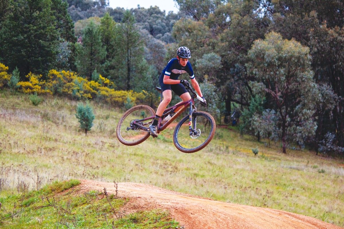Mountain bike rider on jump on course at Pomingalarna Reserve