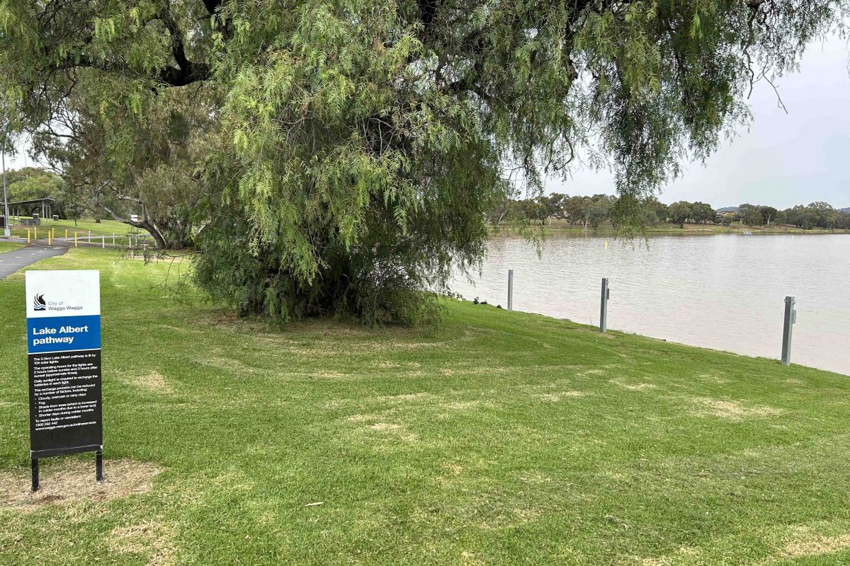 Lake Albert and path sign in overcast conditions