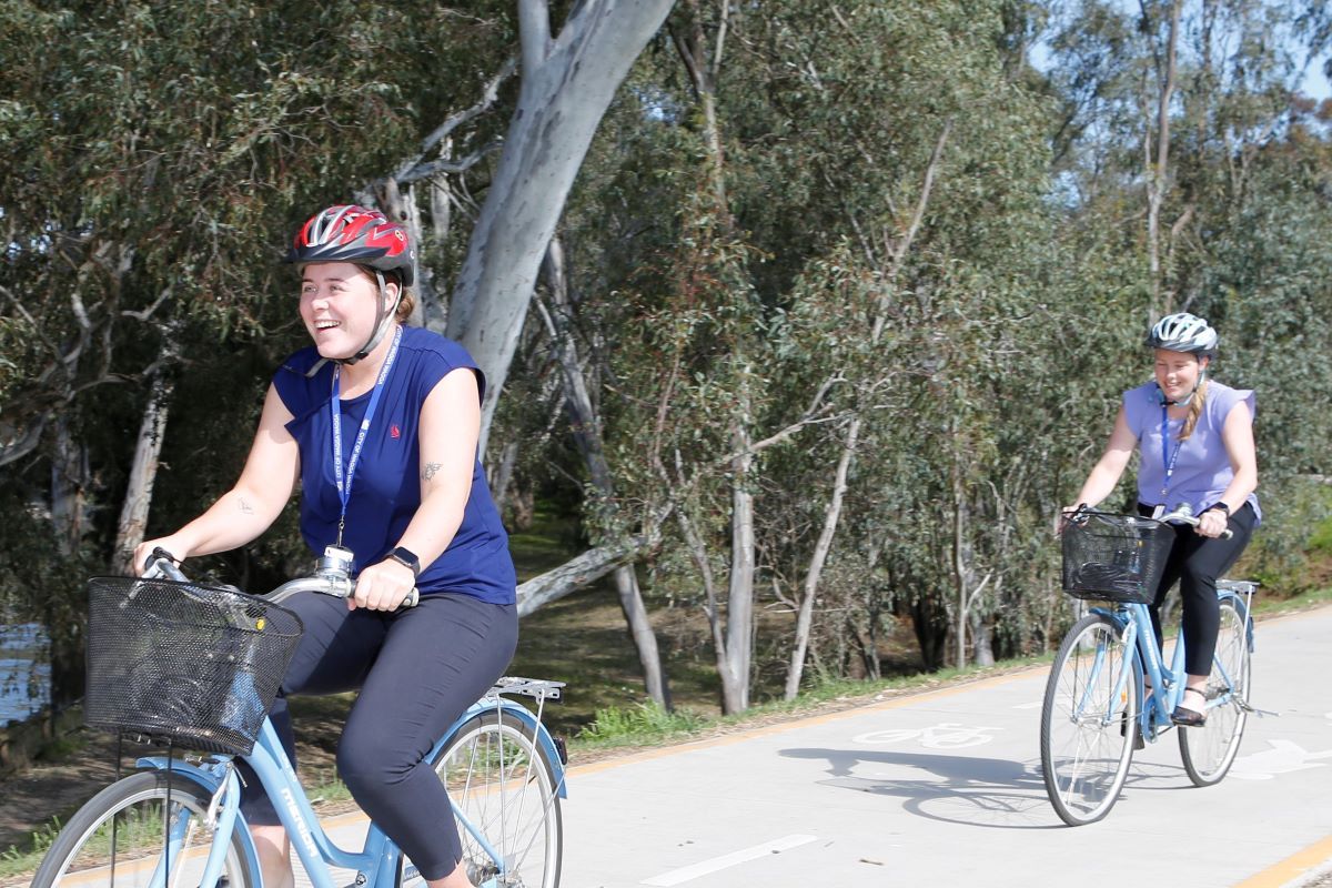 Wagga Wagga City Council Strategic Recreation Officer Kadison Hofert and Health and Wellbeing Officer Taylah Frazier practice their cycling skills ahead of Biketober.