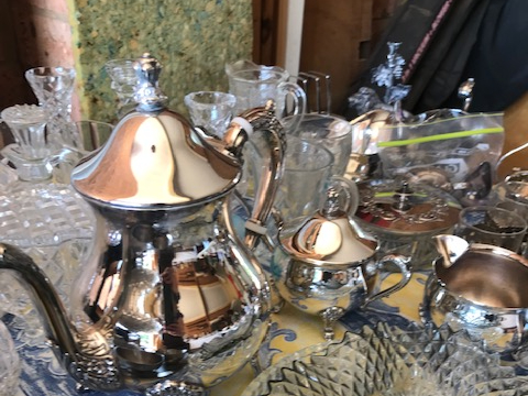 Silver tea set and crystal items