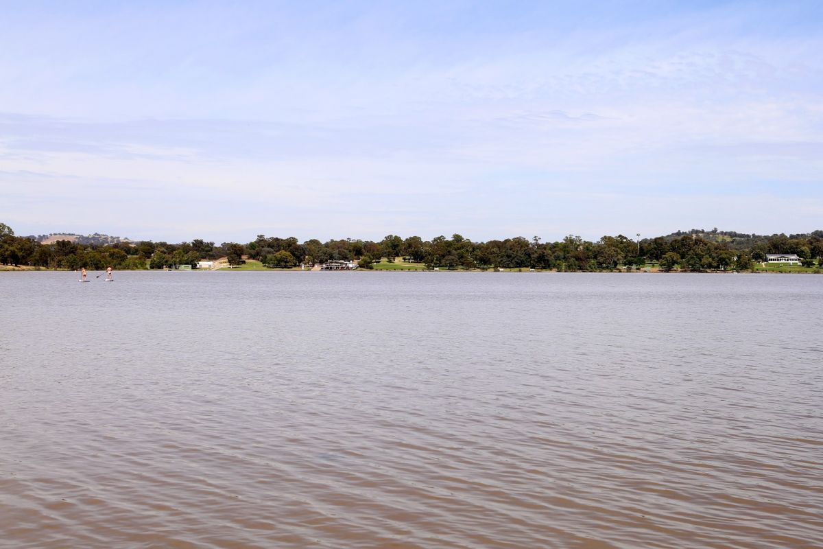 Lake Albert with two paddle boarders in mid-ground