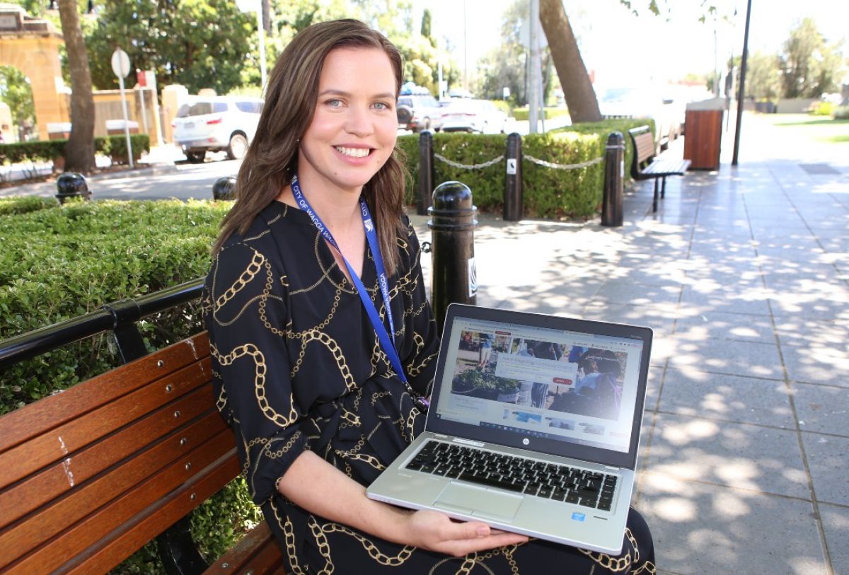 woman sitting on park bench