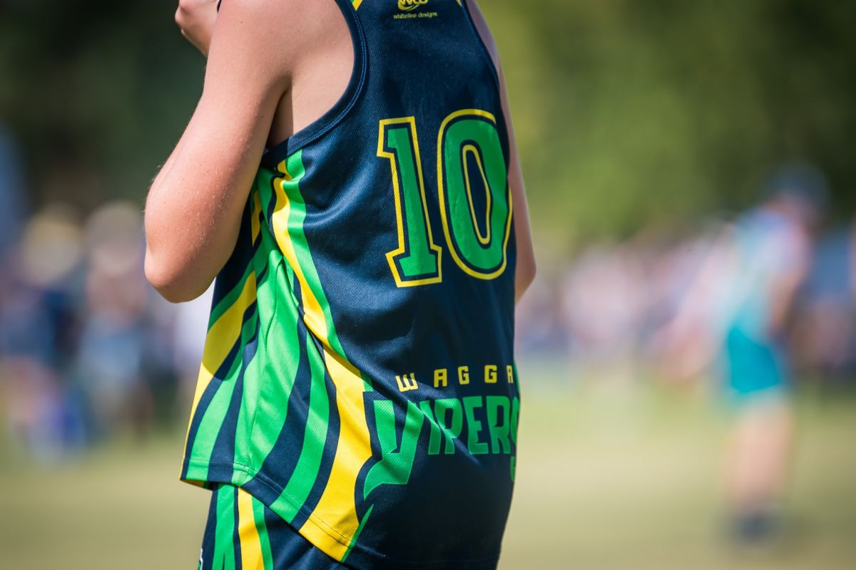 Rear few of touch player, with focus on shirt number