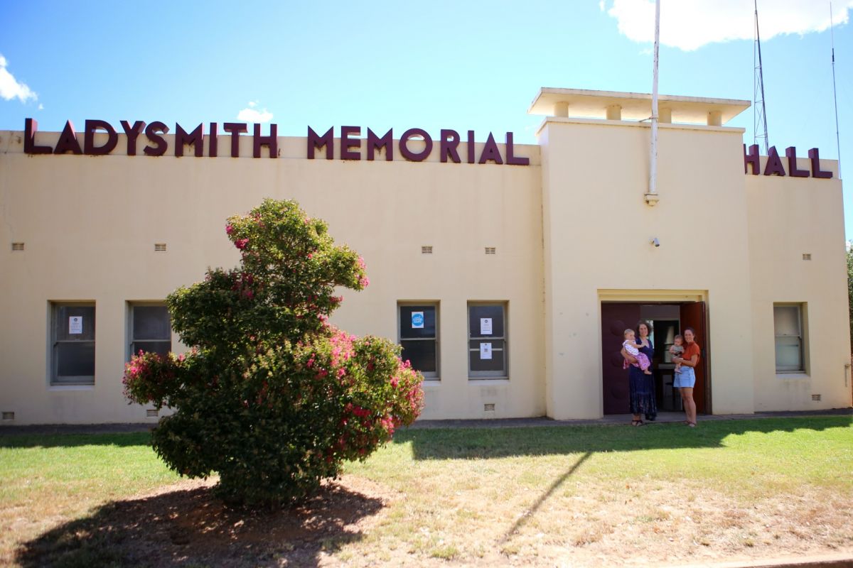 Ladysmith Memorial Hall exterior with two women with young children