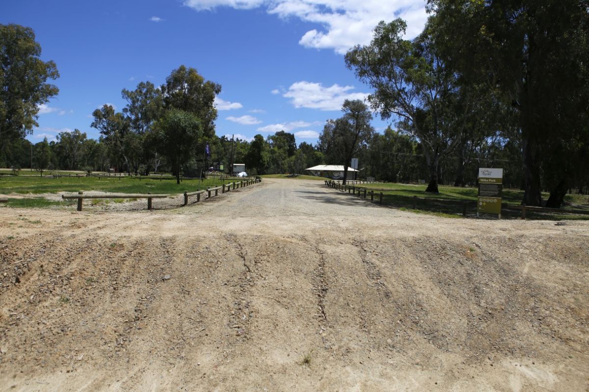 Levee entry to Wilks Park in foreground