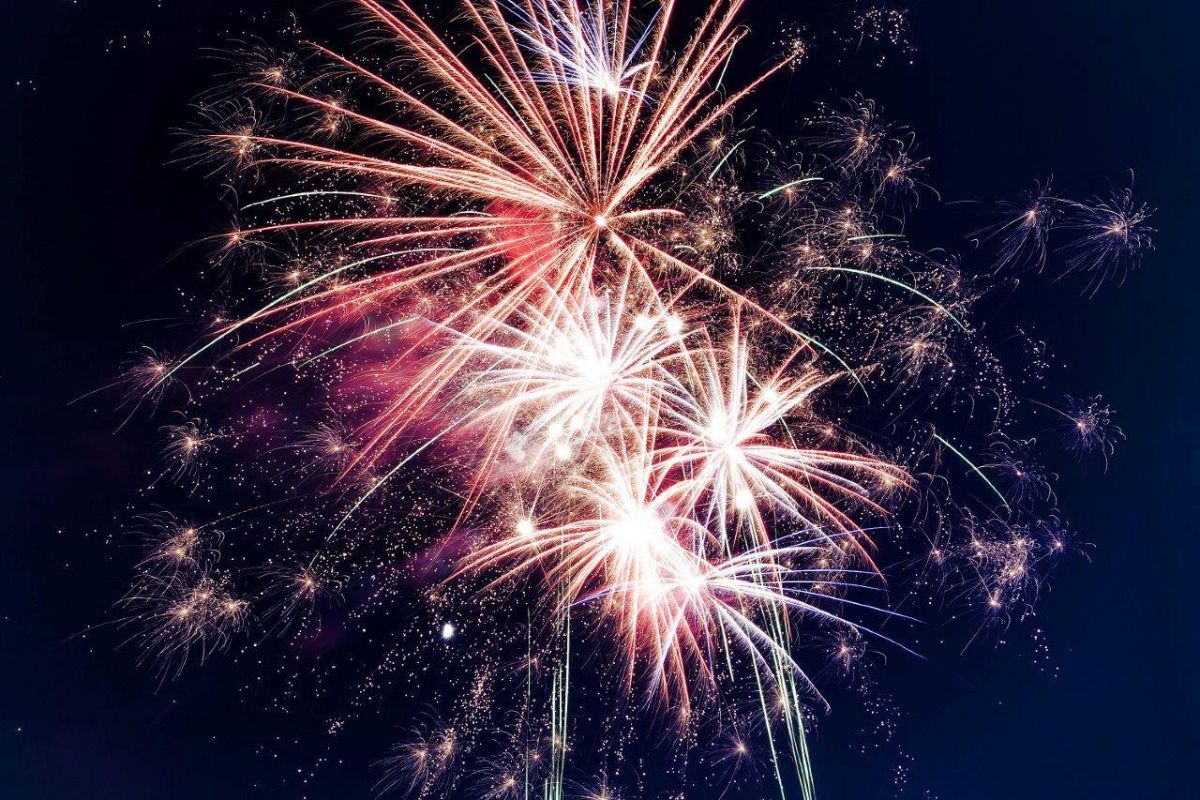 Colourful burst of fireworks against a night sky