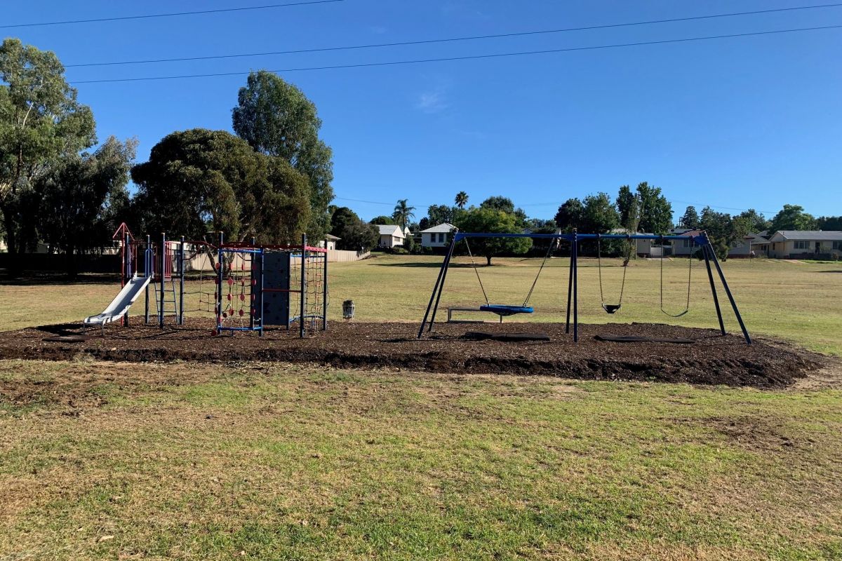 A children's out playground before shade sails were installed. 