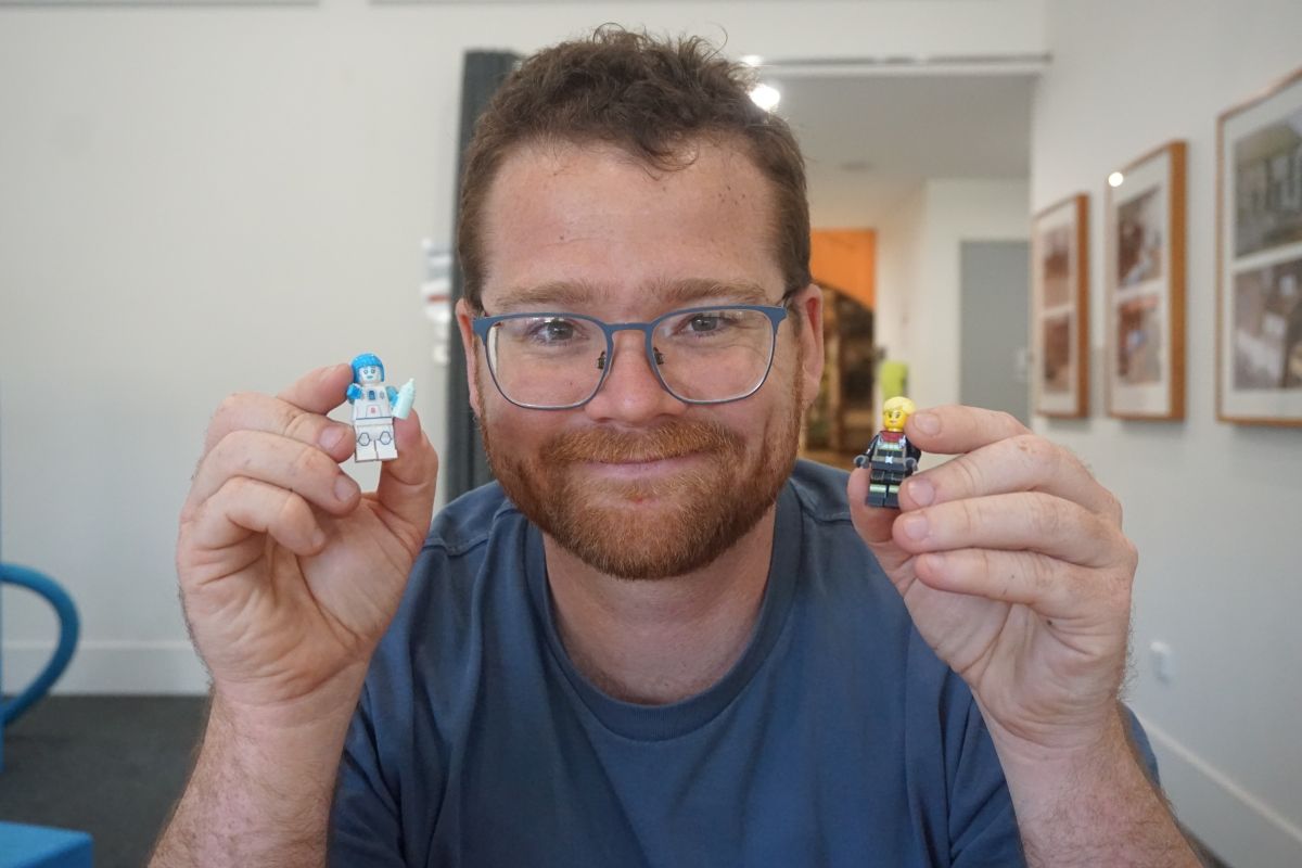 Angus Cawdell-Smith with two LegoMinifigures for October holiday activity