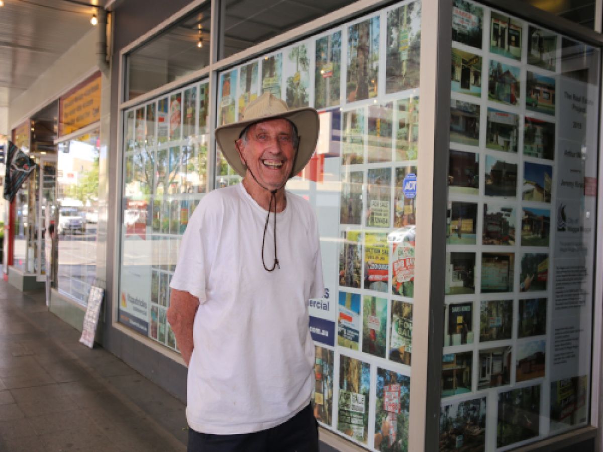 Legendary Wagga artist Arthur Wicks proudly poses alongside his eye-catching installation.