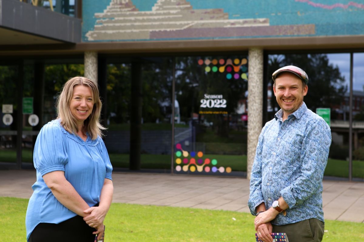 Woman and man standing outside Civic Theatre