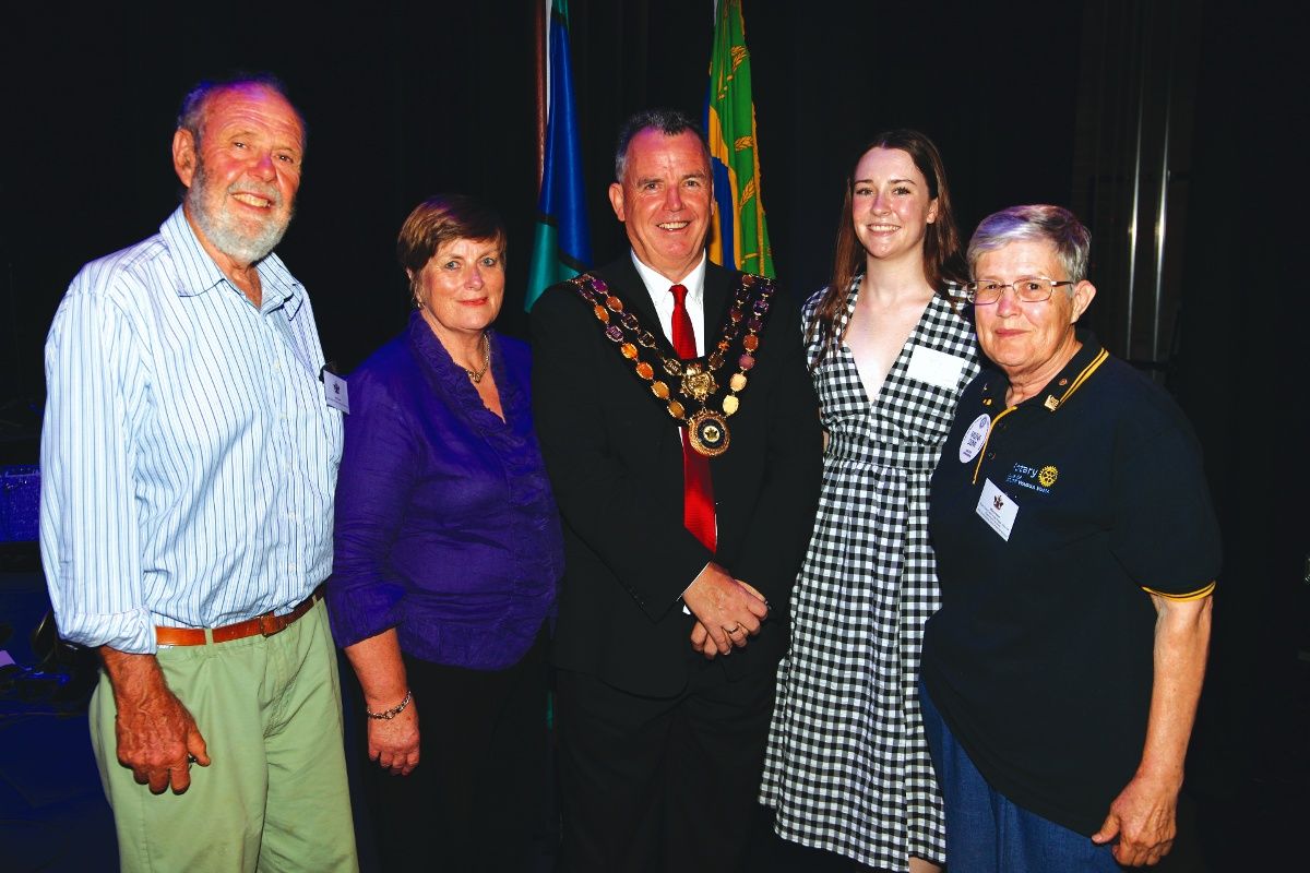 Three men and two women at awards ceremony