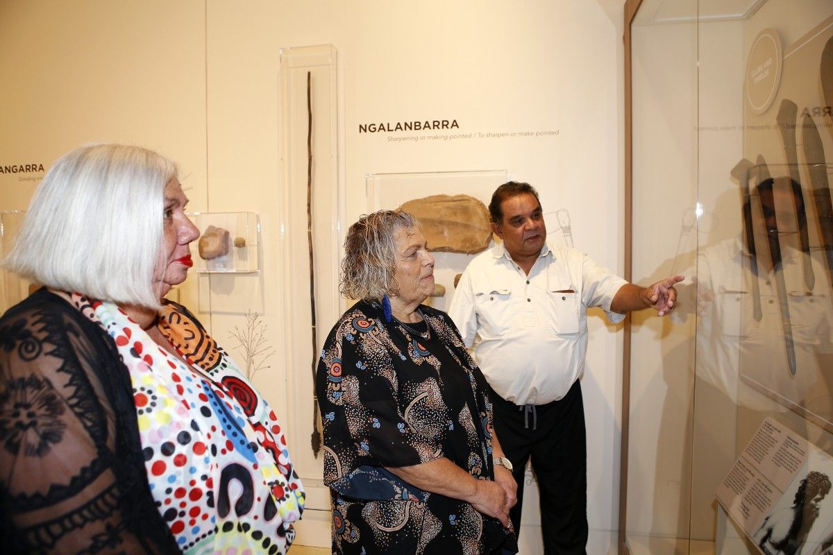 Three Wiradyuri elders (two females & 1 male) viewing indigenous objects at gallery