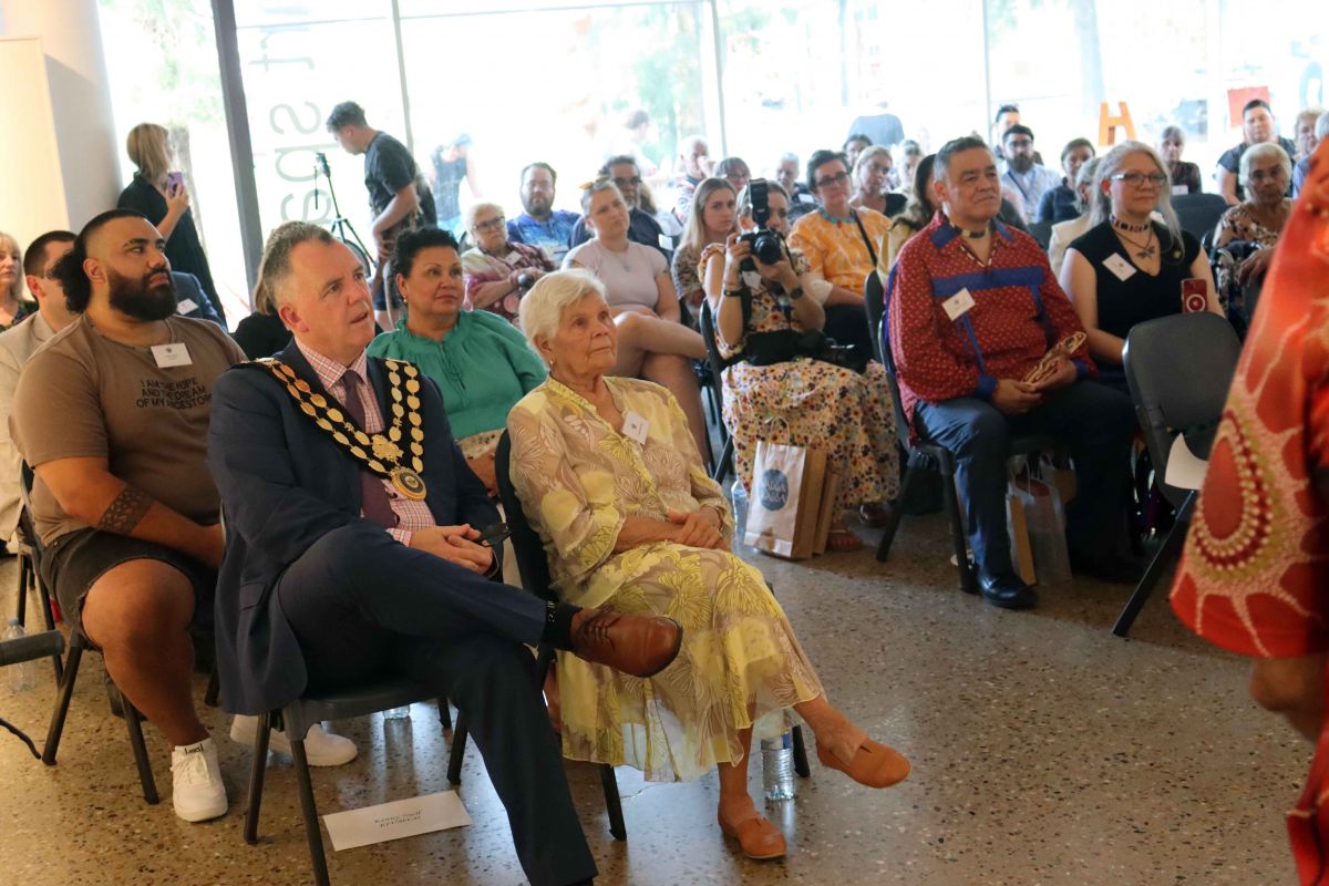 Mayor and Aunty Isabel with Wiradyuri and Canadian First Nations people sitting in room