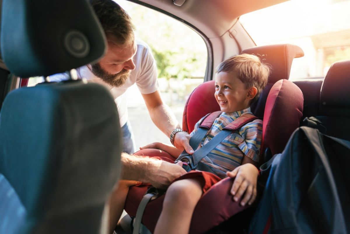 Kid checked in car seat