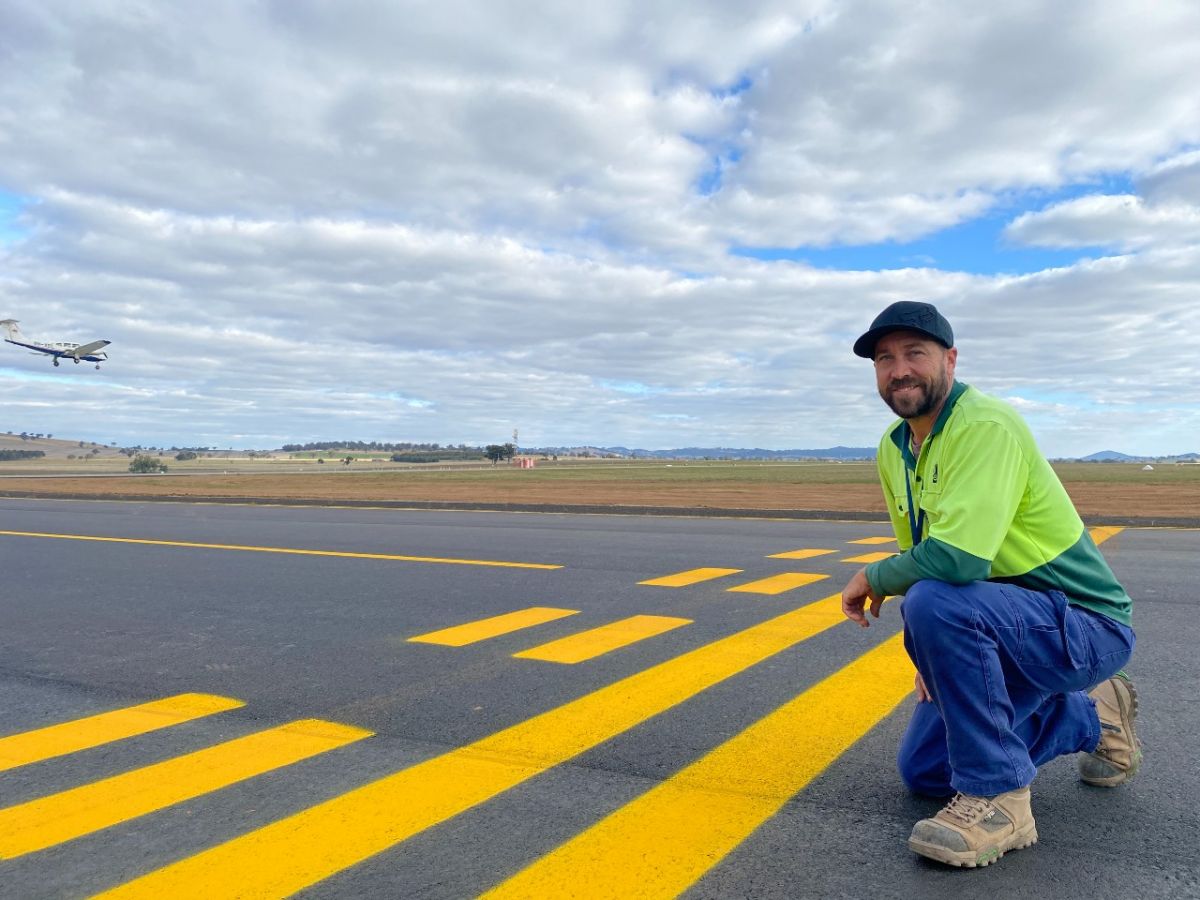 Man on airport runway