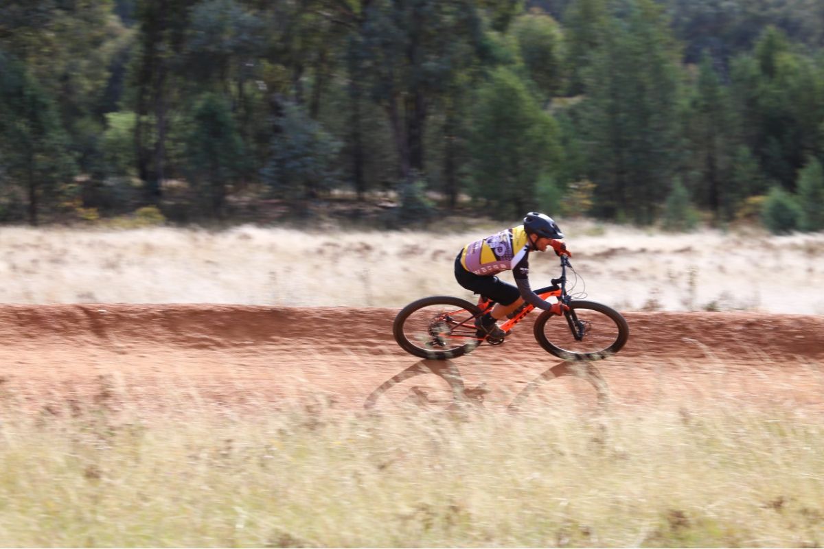 Mountain bike rider on berm