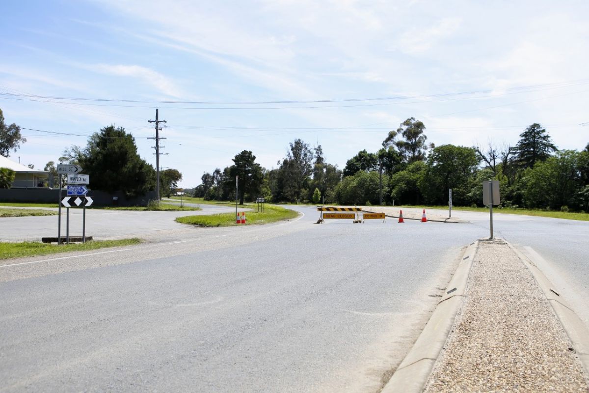 Road closed sign on Hampden Avenue at Mill Street