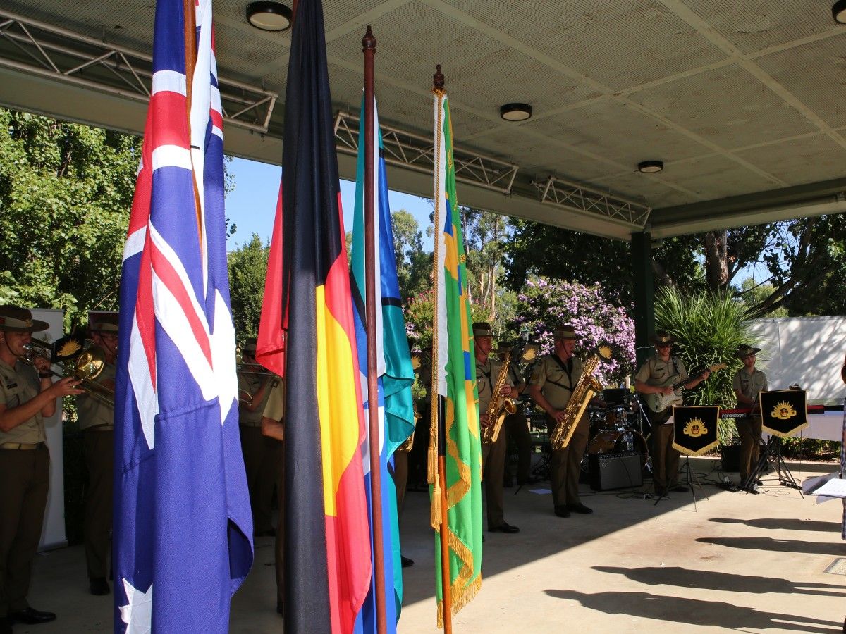 Australian, Aboriginal and Council flags on stage