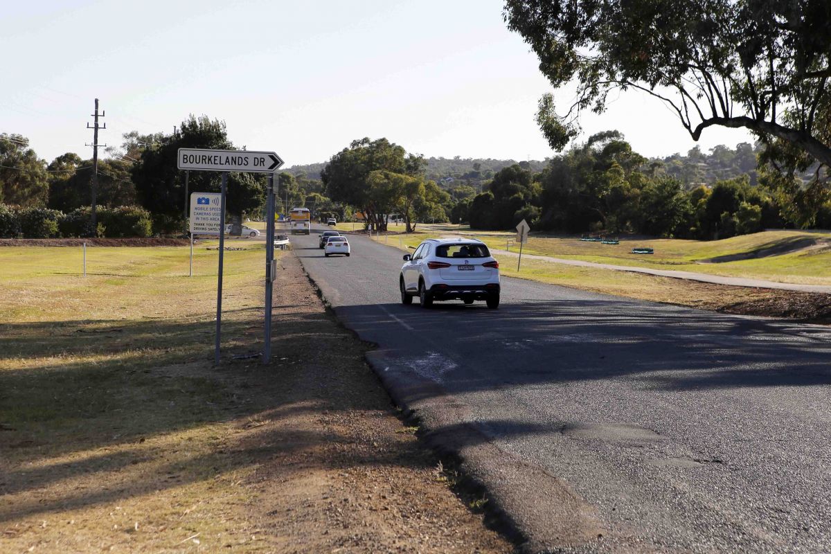 Bourke Street with Bourkelands Drive sign in foreground