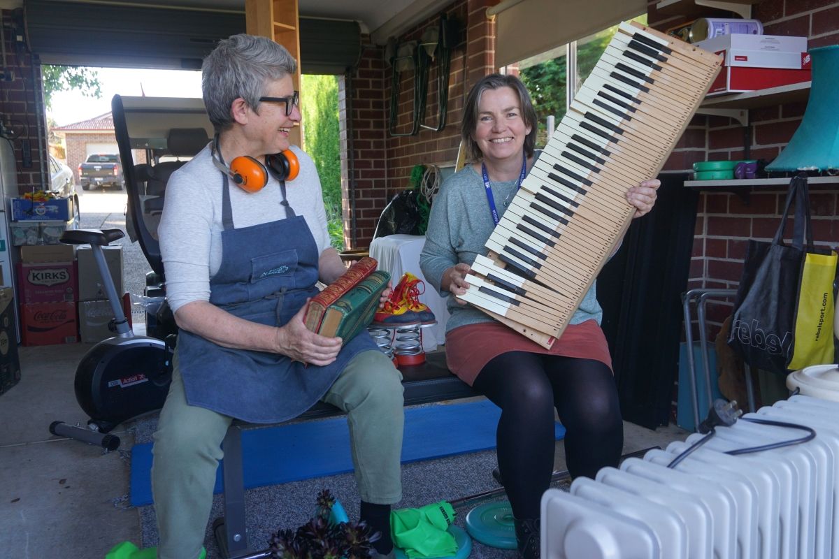 Resident Alison Tokley and Council’s Environmental Education Officer Christina Reid in garage, promoting Garage Sale Trail