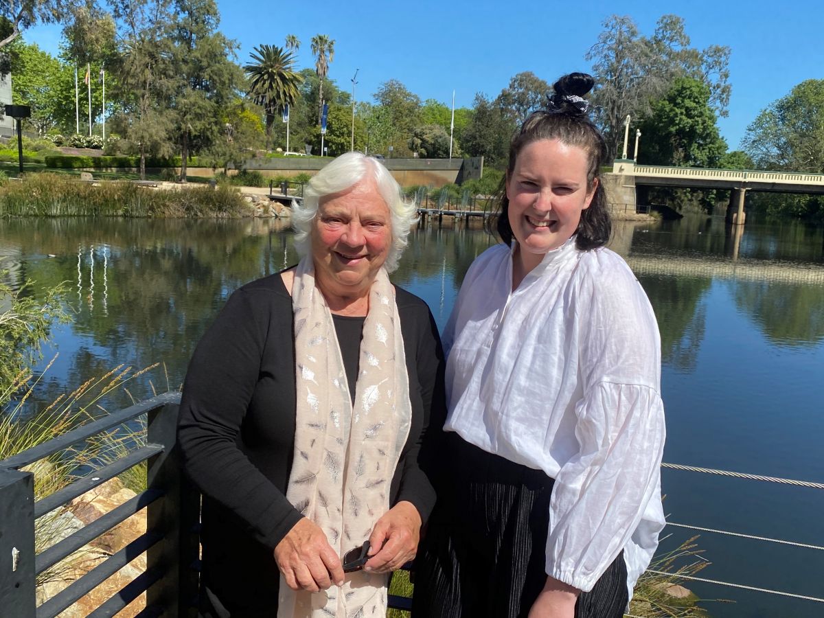 Older woman and younger woman standing near Wollundry Lagoon