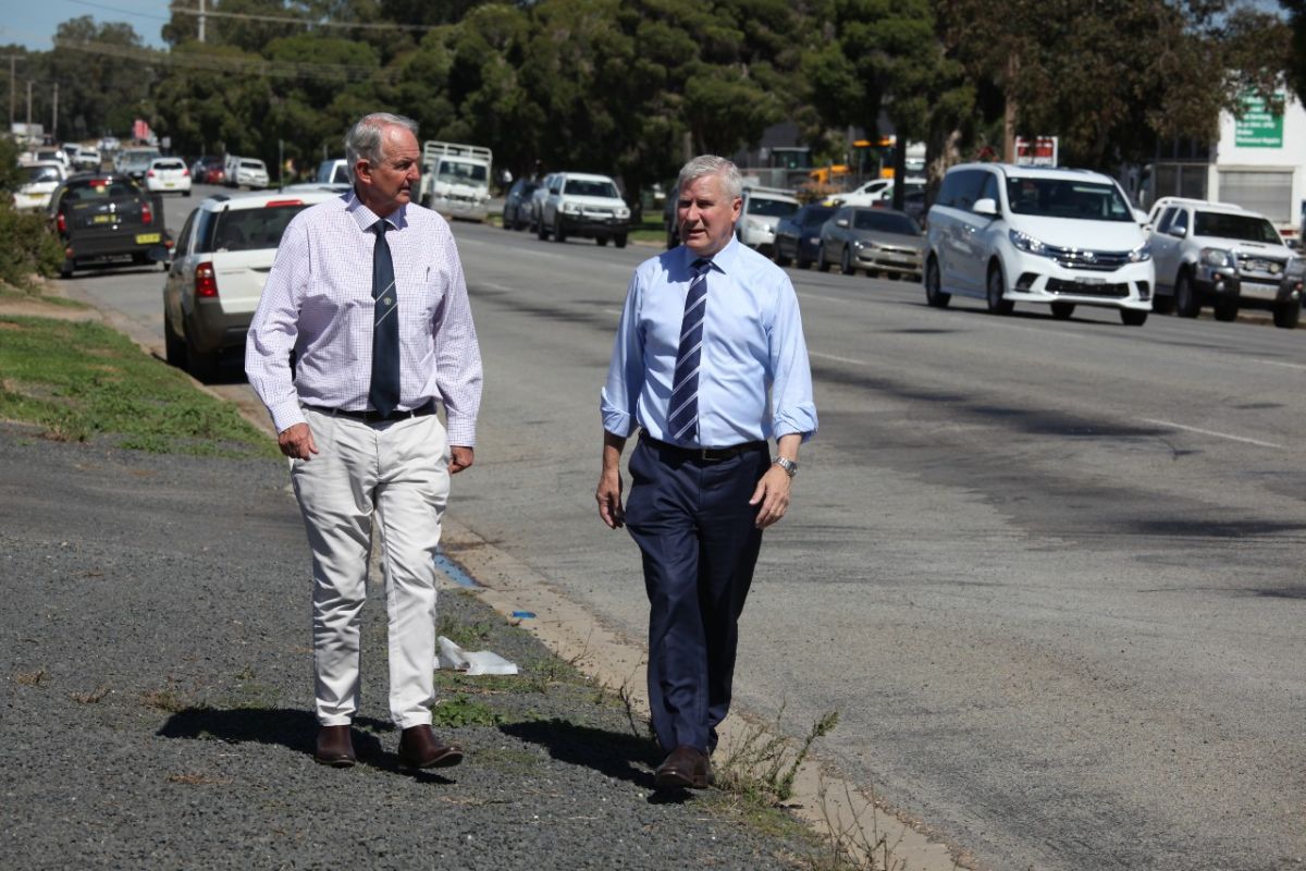 Mayor and MP walking along street