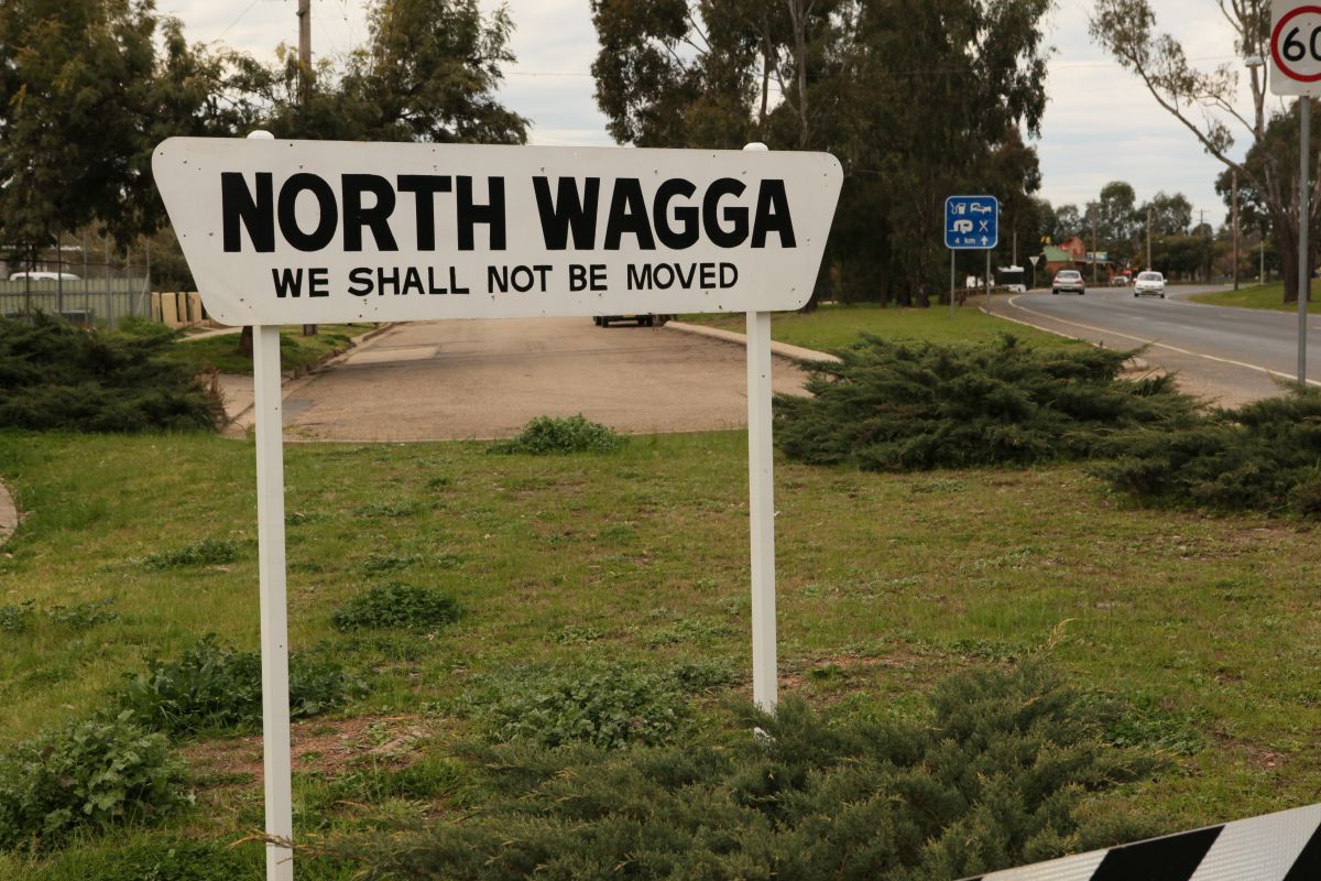 North Wagga sign erected at the entrance to the village. The sign reads 'North Wagga. We Shall Not Be Moved.'