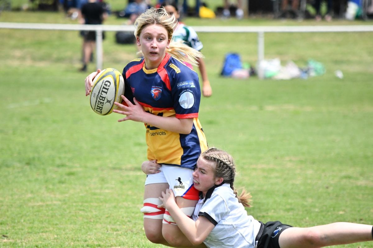 Brumbies' sourced photo of one rugby player tackling another