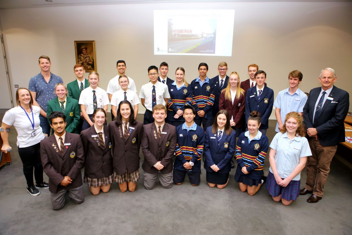 Male and female high school captains, two men and one woman