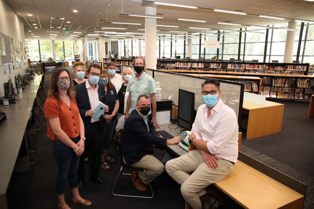 A group of people in a library