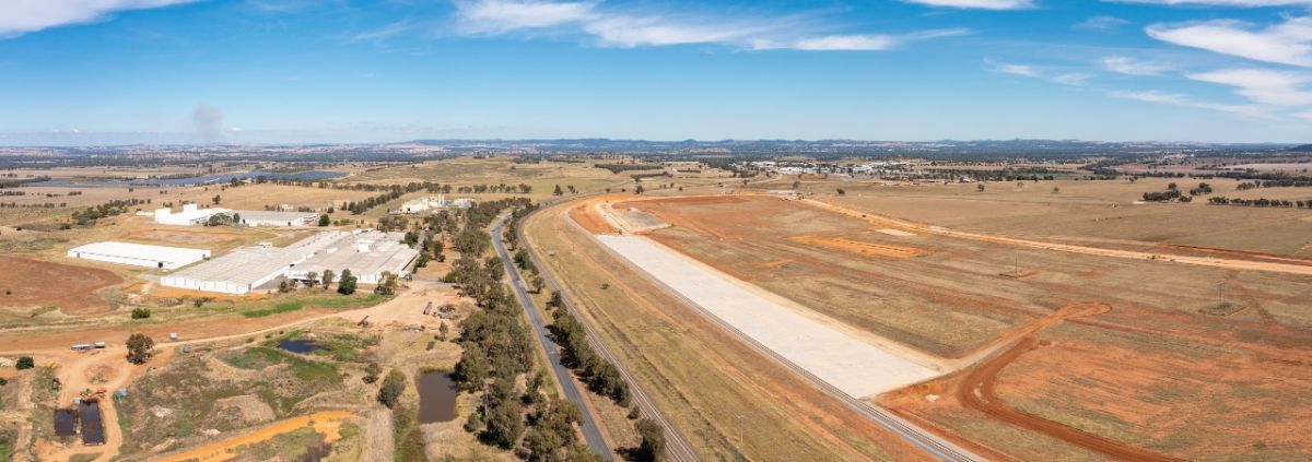 Aerial of RiFL site with paved area beside rail siding