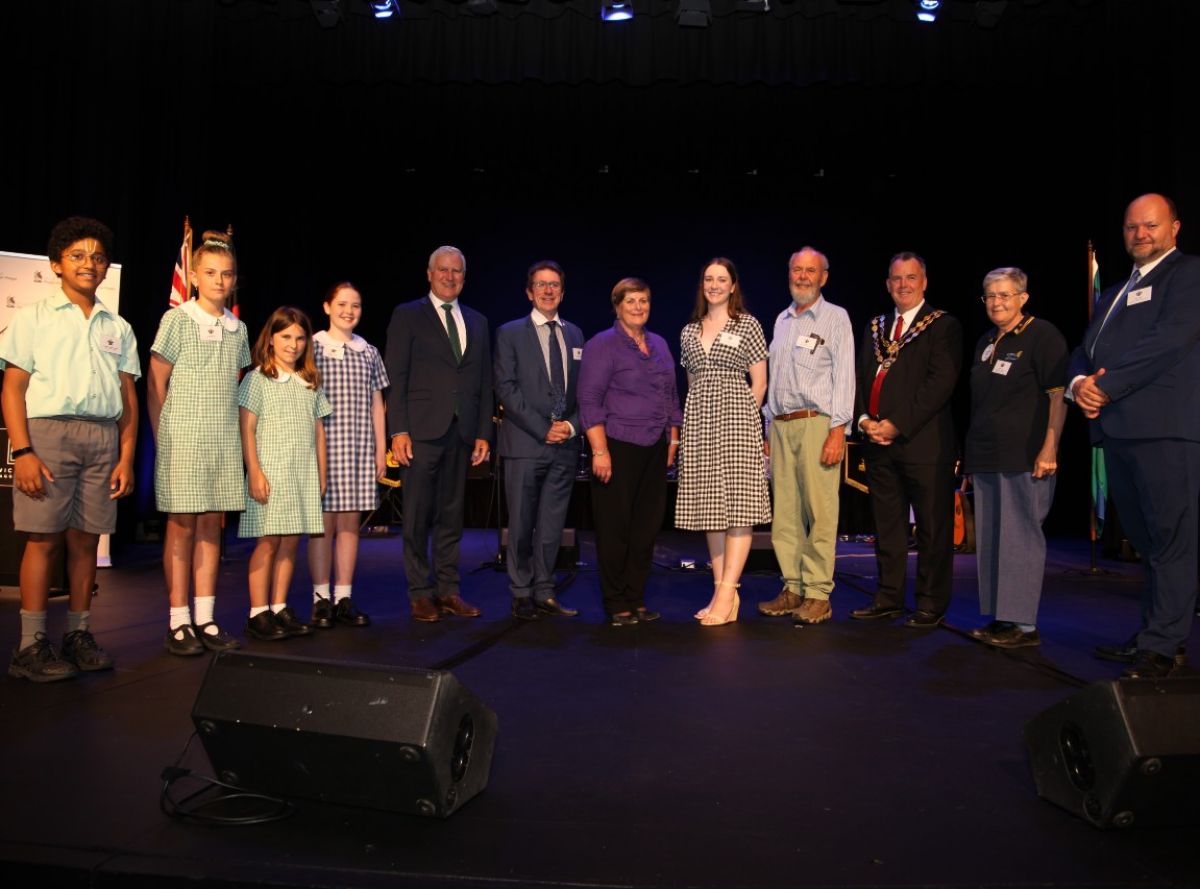 Mix of you and old people on stage at awards ceremony