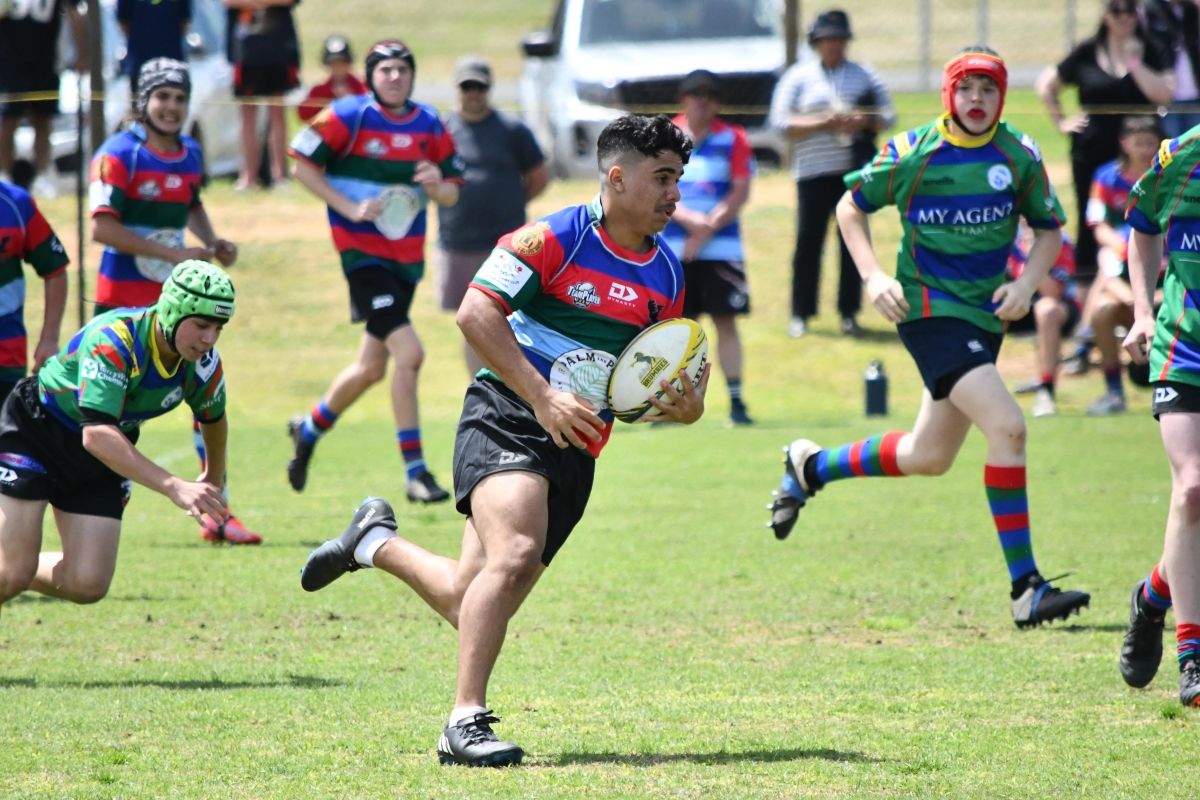 Brumbies' sourced photo of player running with ball