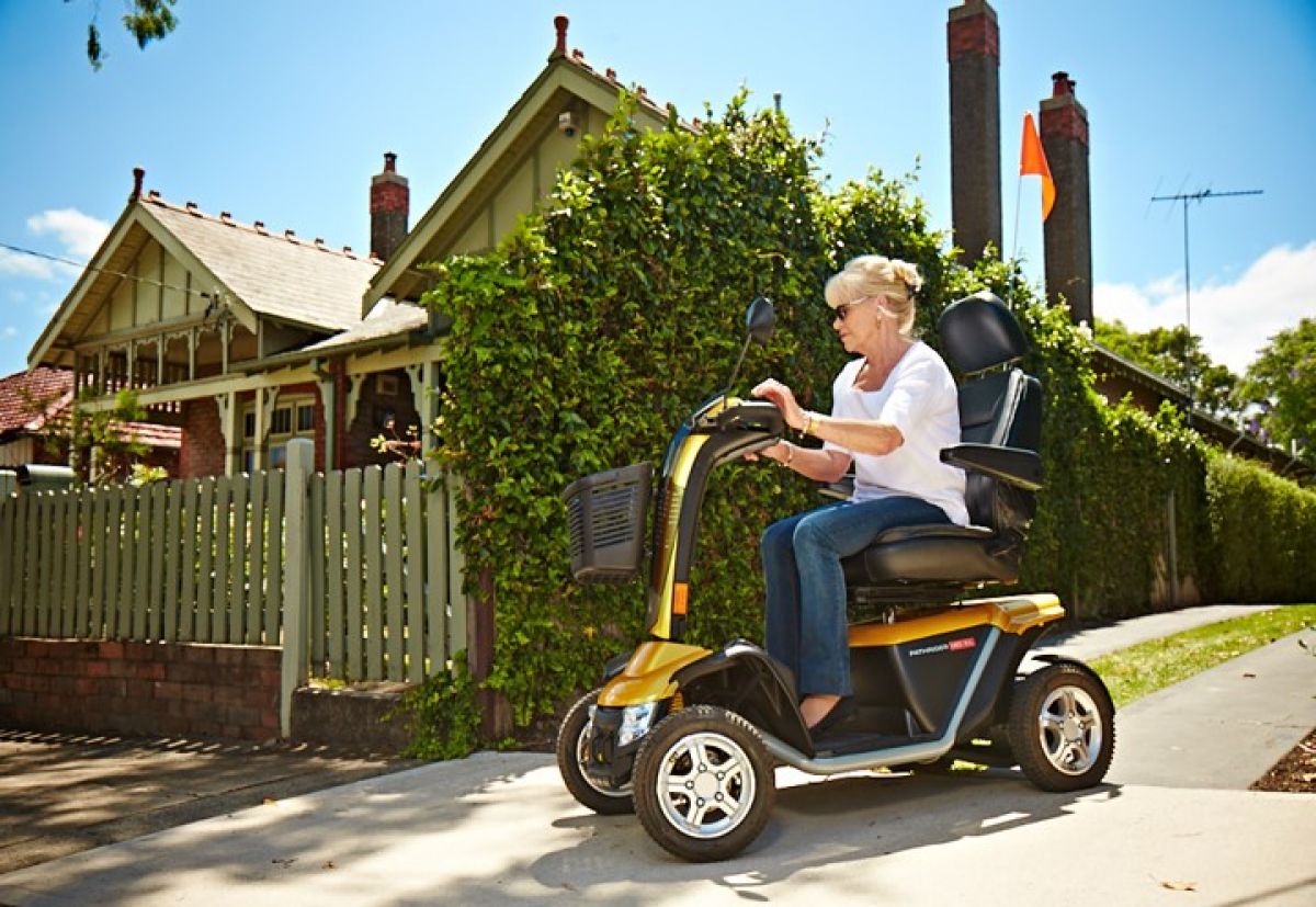 Woman on mobility scooter